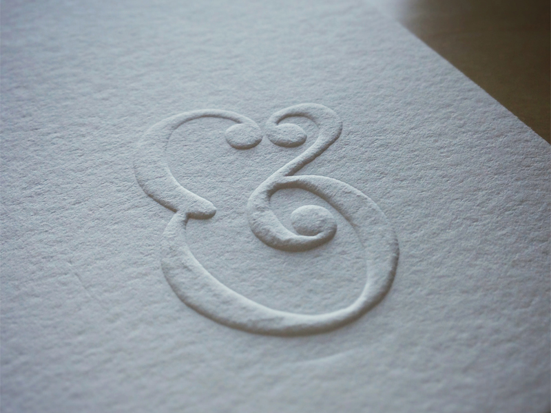 ampersand-embossed